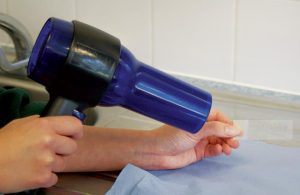 Figure 3. The slide can be air dried (pruritic material) or gently heat fixed with a hair dryer (waxy/oily samples).