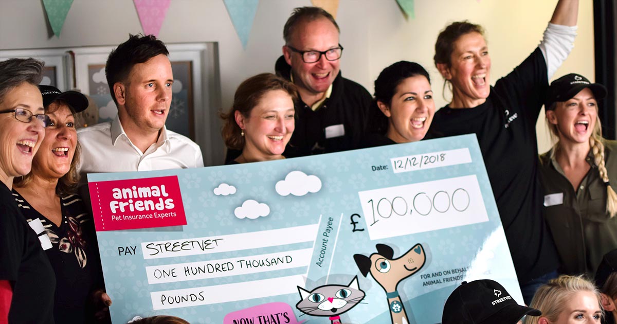 Jade Statt (third right) and StreetVet volunteers celebrate winning the £100,000 prize.