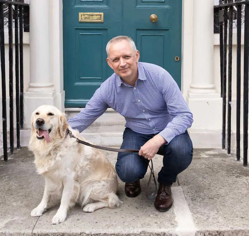 Rob Williams, with a canine companion, outside the BVA headquarters in London