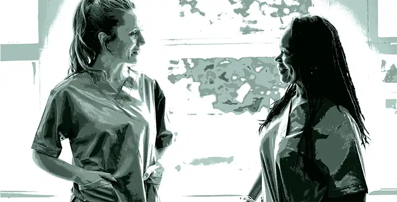 Nurses talking to each other. Image: Rawpixel/ iStock